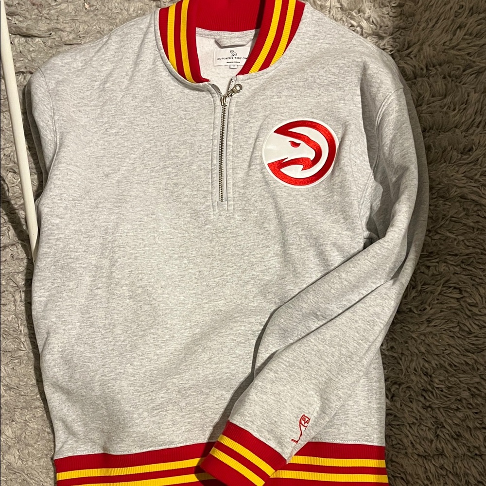 Gray Zip-Up Sweater with Red and Yellow Accents